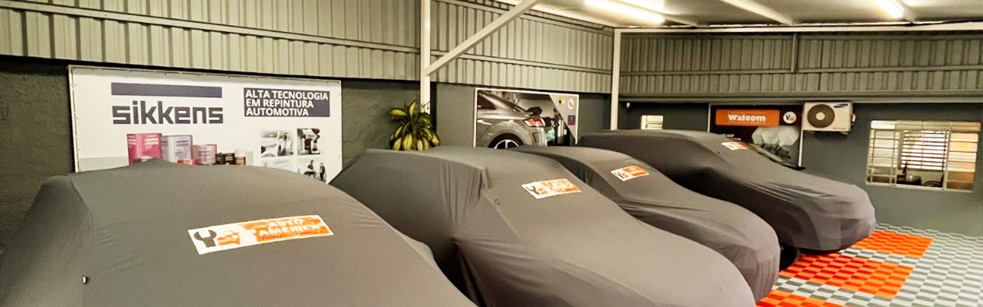 Garagem da Auto América Funilaria e Pintura - Alto da XV - Curitiba